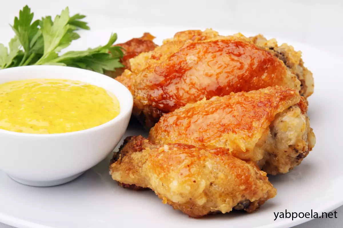Куриные крылышки с чесноком и имбирем в духовке