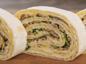 Рулетики из лаваша со шпротами и яйцом